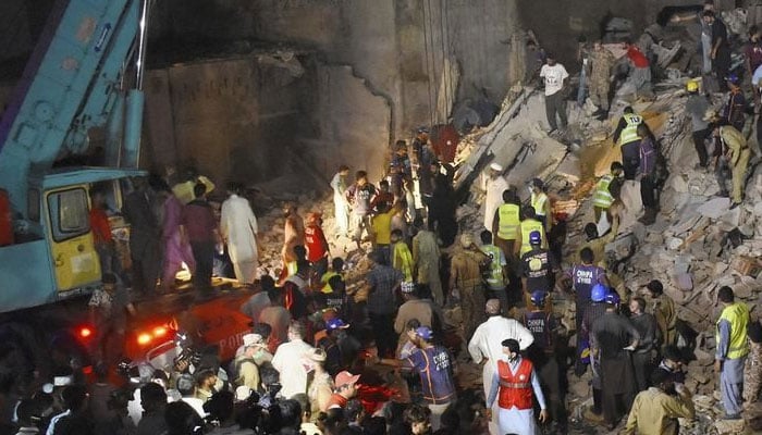 Rescue Efforts Continue After Karachi Building Collapse Kills 14